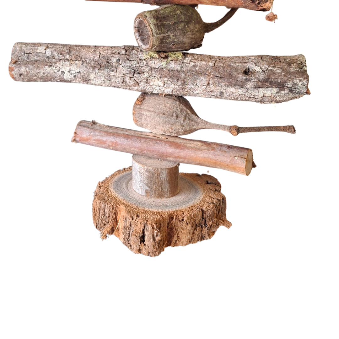Bottom half of the natural bird toy with chunky wood slices and gumnuts